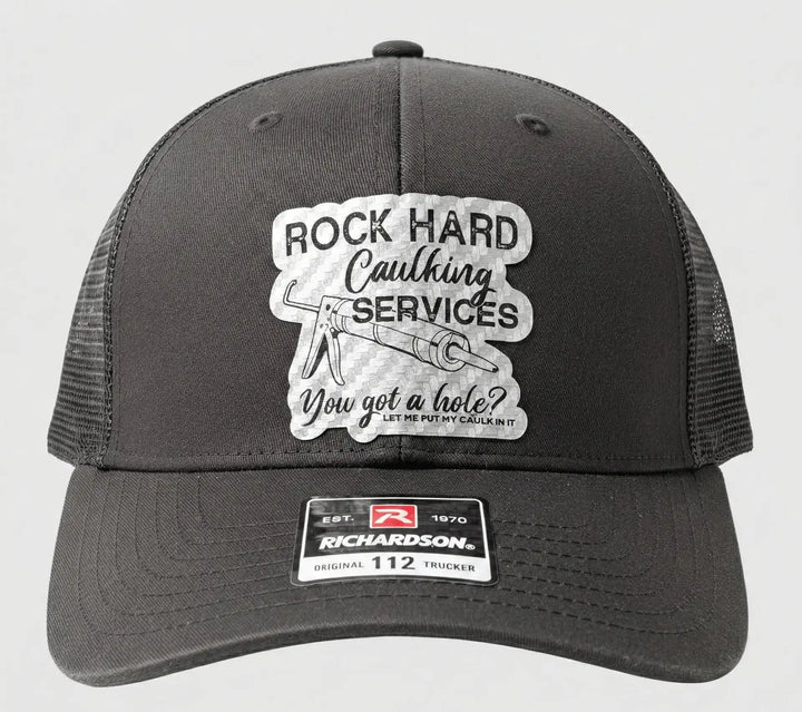 Rock Hard Caulking Services Trucker Hat - Charcoal Carbon Fiber Patch