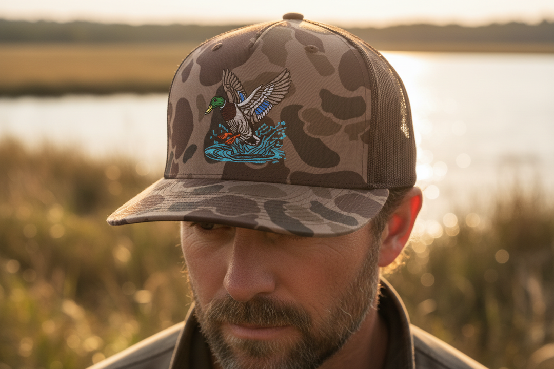 Tight shot of model in duck hunting hat at golden hour