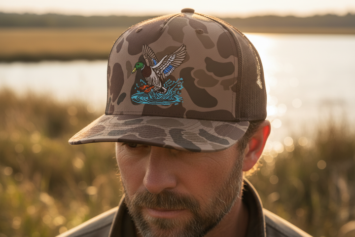 Tight shot of model in duck hunting hat at golden hour